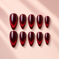 Garnet Glow burgundy cat eye almond press-on nails by Verozi – front view
