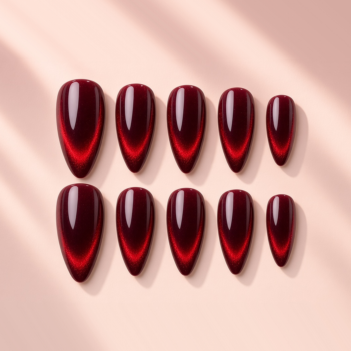 Garnet Glow burgundy cat eye almond press-on nails by Verozi – front view