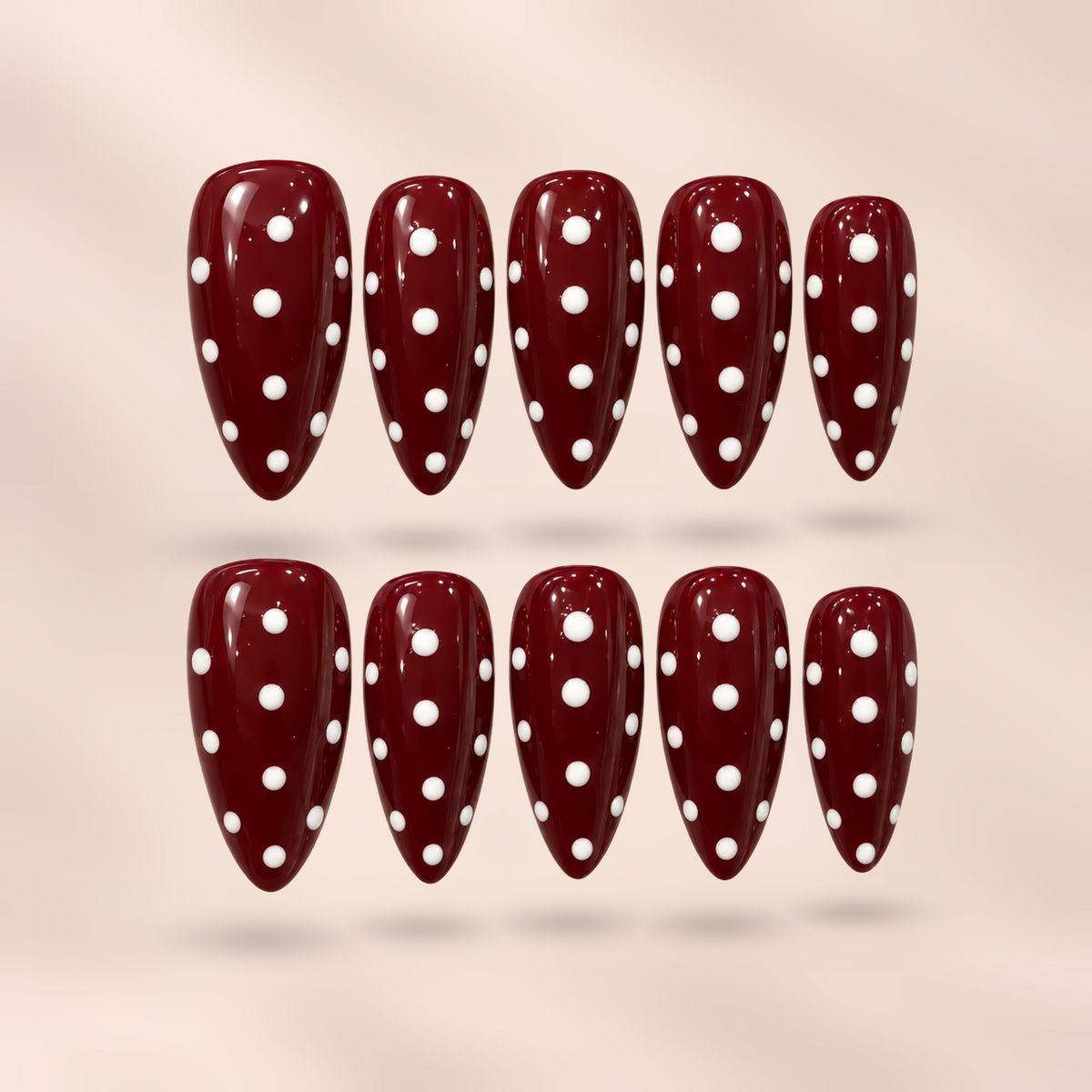 Ruby Polka burgundy polka dot almond press-on nails by Verozi – front view